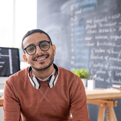 smiling-young-arabian-programmer-R2B7YMA.jpg